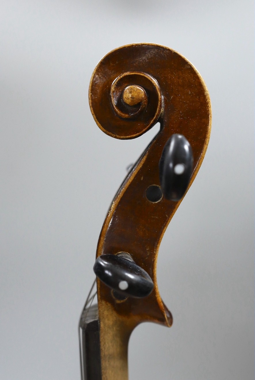 A Maidstone violin, with bow, cased. violin 59 cms high.